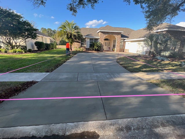 New concrete driveway in front of a Central Florida house.